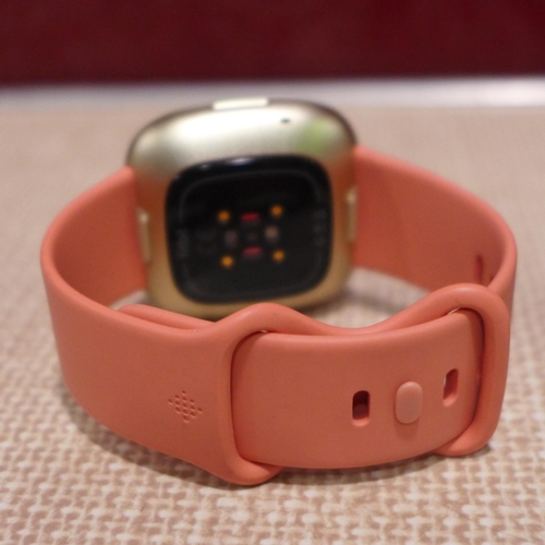 3084 - Fitbit Versa 3 - Pink/Gold, original RRP £124.99 + VAT (283-41) * This lot is subject to VAT