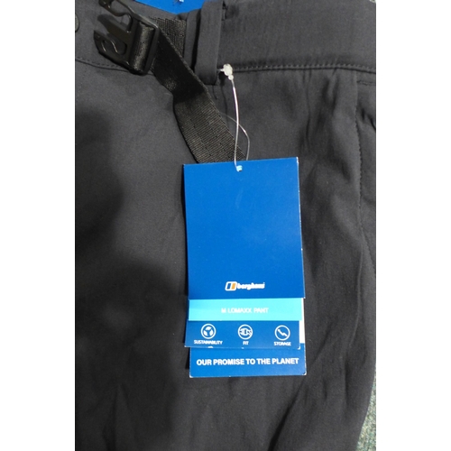 3168 - Bag of mixed sized black Lomaxx Berghaus trousers