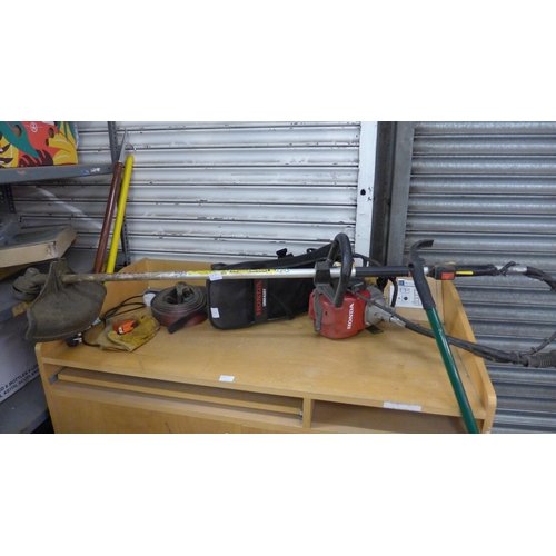 2470 - Honda UMR 435T back pack mounted petrol strimmer