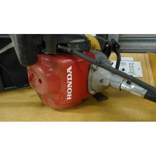 2470 - Honda UMR 435T back pack mounted petrol strimmer