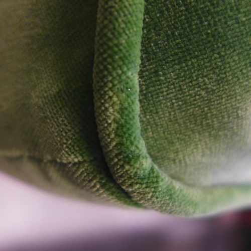 1677 - A moss green velvet button top small footstool, loose stitching