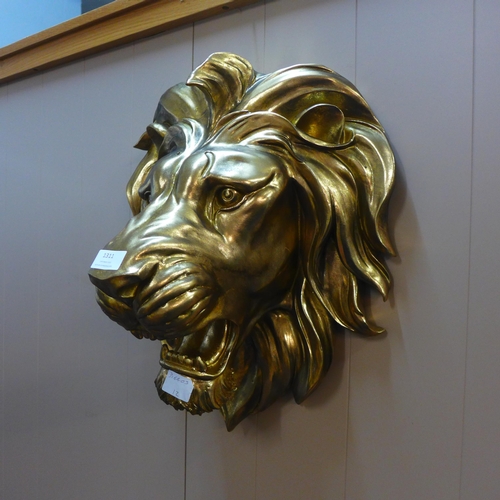 1311 - A gold lion bust