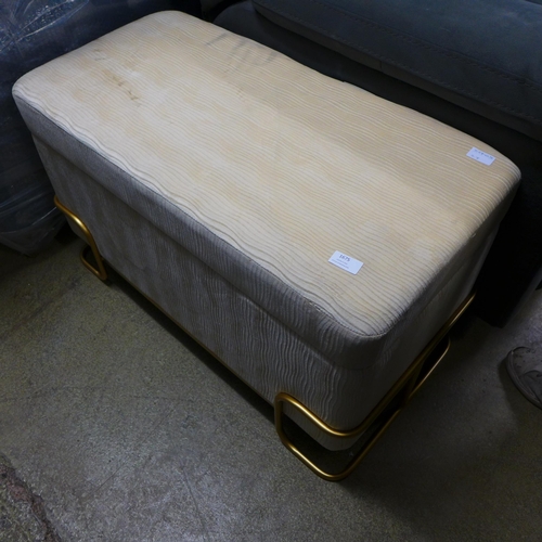 1675 - A cream upholstered ottoman footstool