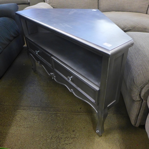 1678 - A silver two drawer corner media unit