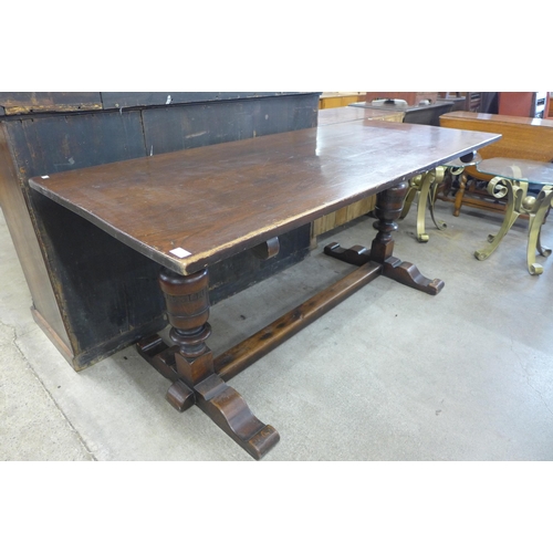 122 - A 17th Century style oak refectory table