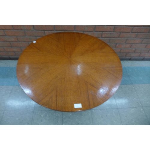 1 - A Danish Kubus teak circular sunburst topped coffee table, designed by Soren Georg Jensen