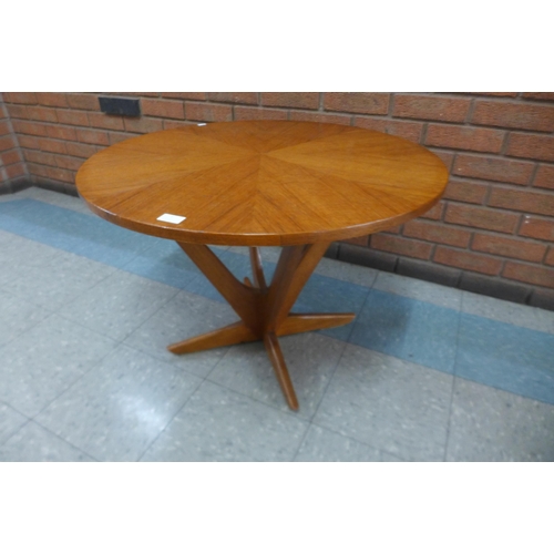 1 - A Danish Kubus teak circular sunburst topped coffee table, designed by Soren Georg Jensen