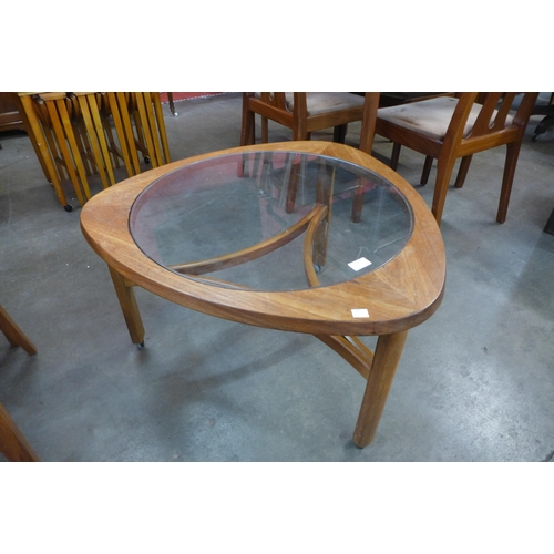 11 - A Nathan teak and glass topped triangular coffee table