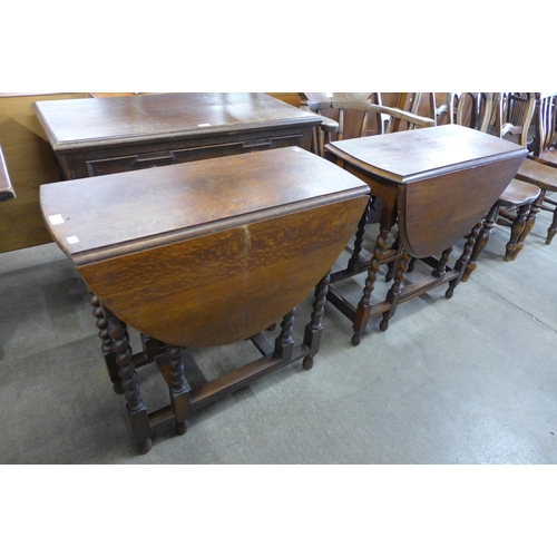 120 - Two oak barleytwist gateleg tables