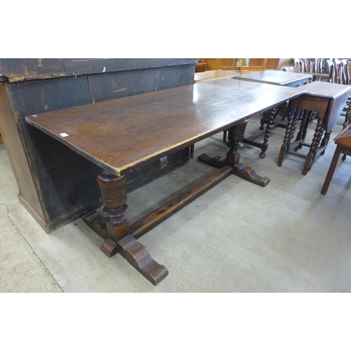 122 - A 17th Century style oak refectory table