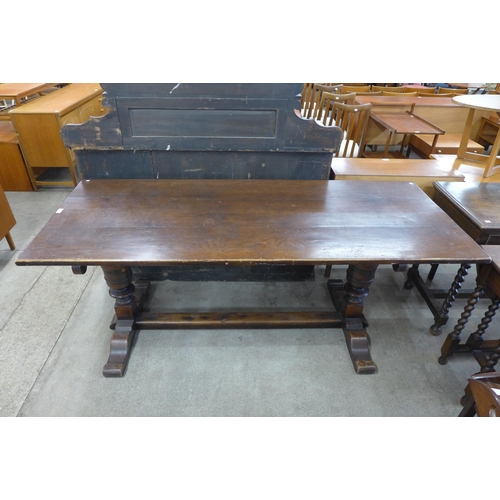 122 - A 17th Century style oak refectory table