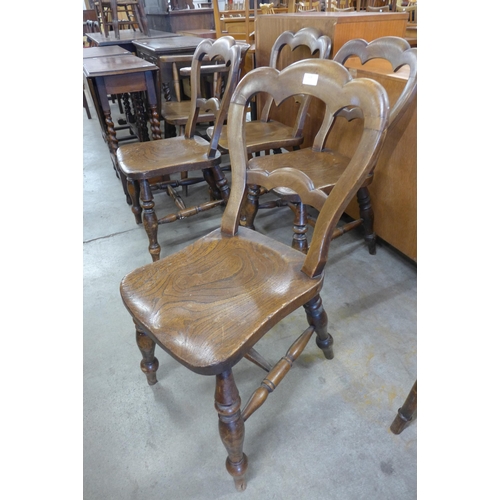 124 - A set of four Victorian elm and mahogany kitchen chairs