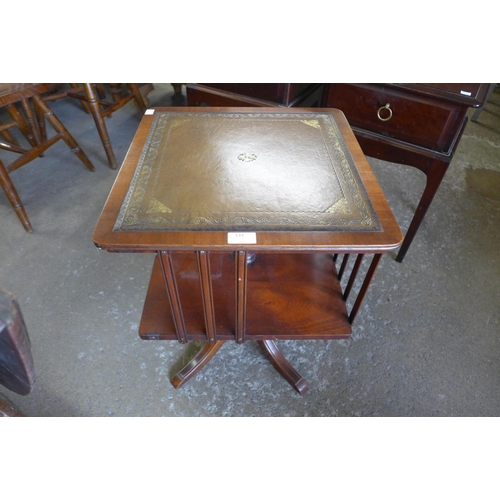 133 - A Bevan Funnell mahogany and green leather topped revolving bookcase