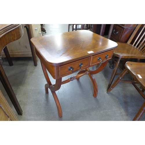 139 - A small inlaid mahogany two drawer side table