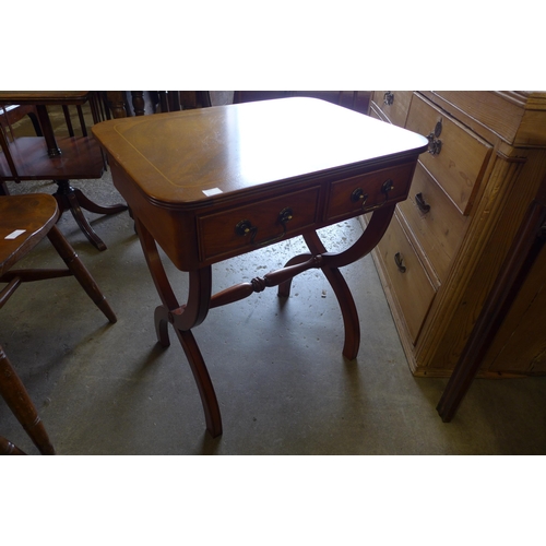 139 - A small inlaid mahogany two drawer side table