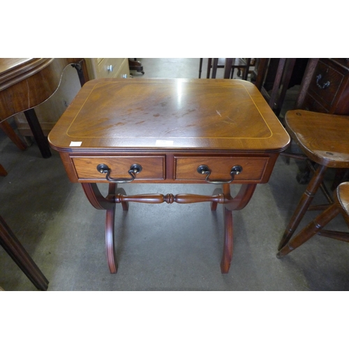 139 - A small inlaid mahogany two drawer side table