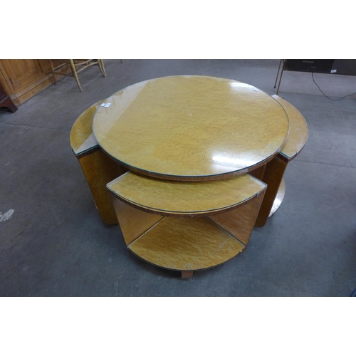 163 - An Art Deco birds eye maple circular nest of tables