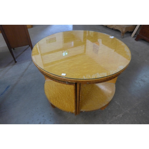 163 - An Art Deco birds eye maple circular nest of tables