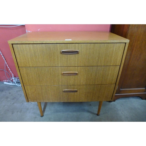 18 - A teak chest of drawers