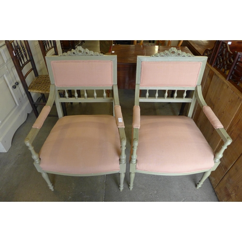 181 - A pair of French painted beech and fabric upholstered fauteuil chairs