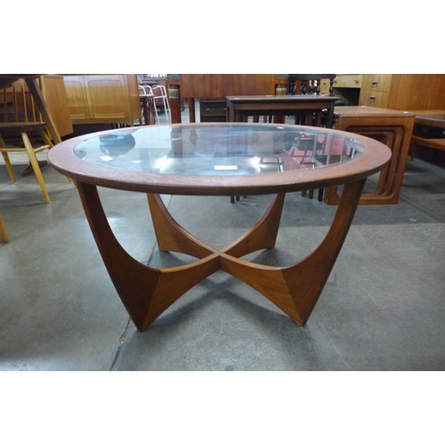 2 - A G-Plan Astro teak and glass topped circular coffee table