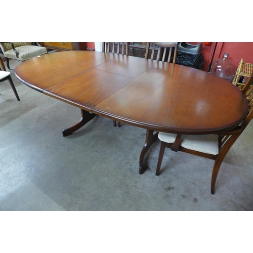 21 - A G-Plan Fresco teak extending dining table and six chairs