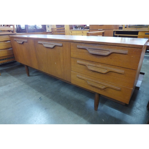 29 - A Jentique teak sideboard