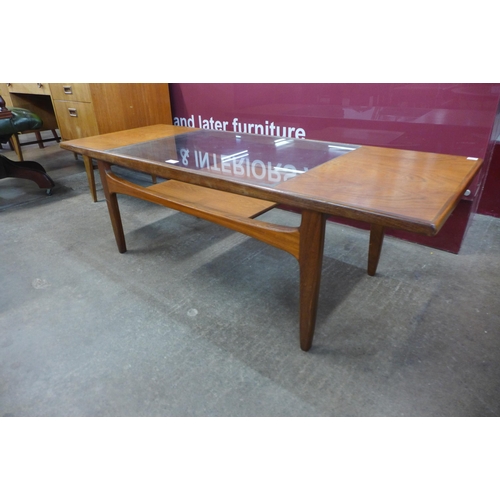 3 - A G-Plan Fresco teak and glass topped rectangular coffee table