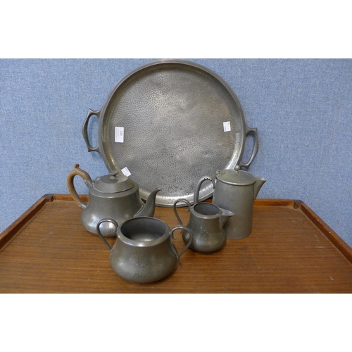 310 - An Arts and Crafts pewter five piece tea and coffee service