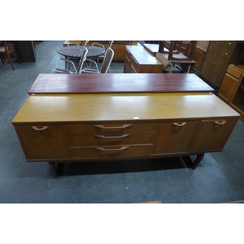 38 - A teak sideboard