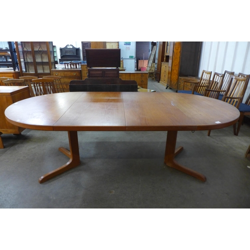 41 - A Danish teak extending dining table