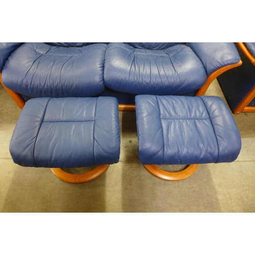 44 - A Norwegian Ekornes Stressless beech and blue leather five piece lounge suite, comprising; two sette... 