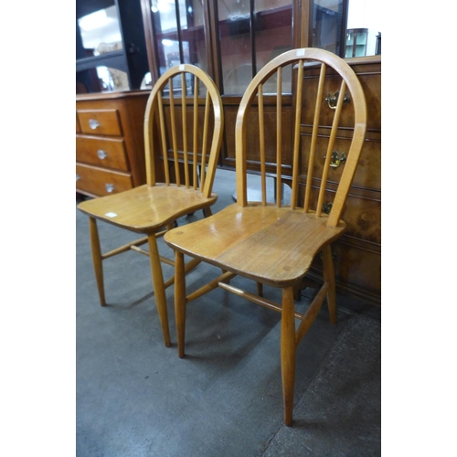 47 - A pair of Ercol Blonde elm and beech Windsor chairs