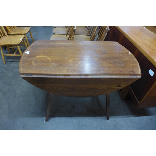 48 - An Ercol elm and beech Windsor drop-leaf table