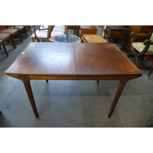 8 - A McIntosh teak extending dining table