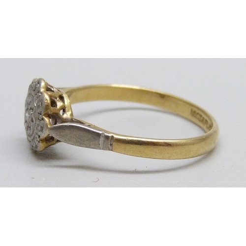 1001 - An 18ct gold and platinum set diamond ring, 2.4g, O