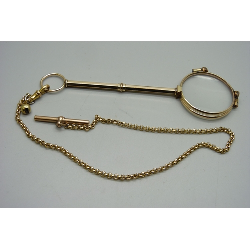 1046 - A pair of gold plated lorgnettes on a chain, and a 9ct gold T bar, T bar weighs 2g