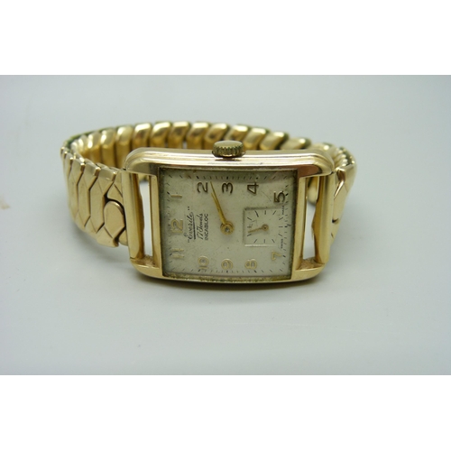 1047 - A 9ct gold Everite wristwatch