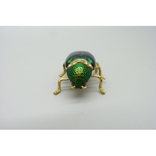 1050 - A costume brooch in the form of a beetle