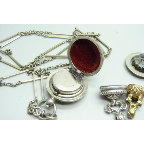 1068 - A sovereign case, a Masonic swivel pendant, two fobs and a Victorian part chain