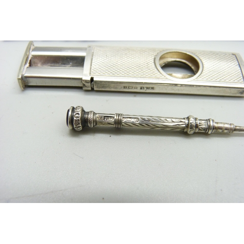 1080 - Two silver pencils and a white metal pencil with amethyst top, and a silver cigar cutter