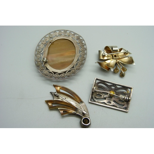 1108 - Four silver brooches