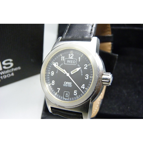 1117 - An Oris day date wristwatch with box and papers