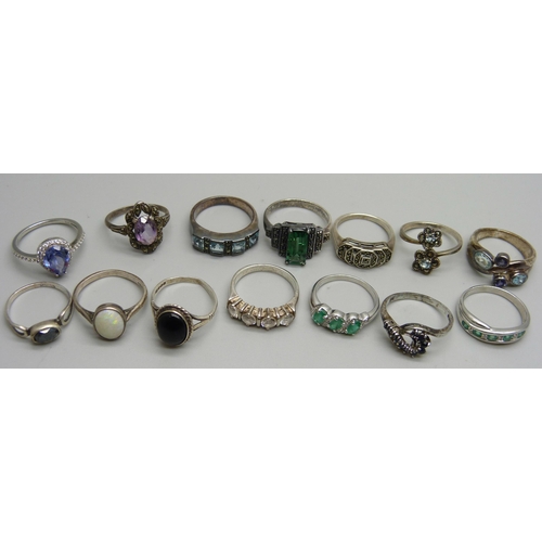 1128 - Fourteen silver rings