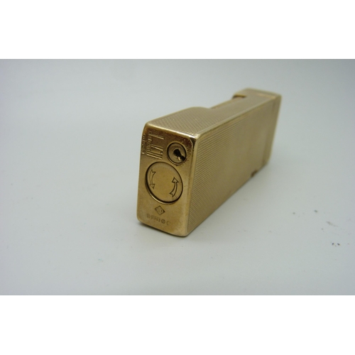 1146 - A 9ct gold Dunhill lighter, with case