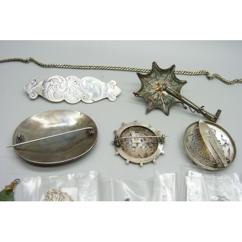 1164 - A collection of jewellery including two large silver brooches, a silver clip etc.