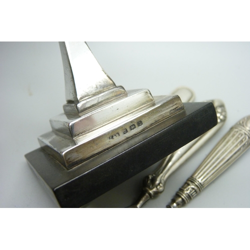 1167 - An Art Deco manicure stand, Birmingham 1935 and seven tools, six have silver handles