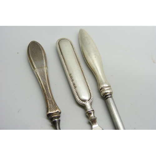 1167 - An Art Deco manicure stand, Birmingham 1935 and seven tools, six have silver handles