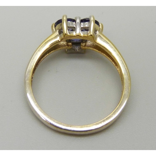 1180 - A silver gilt and tanzanite ring, O