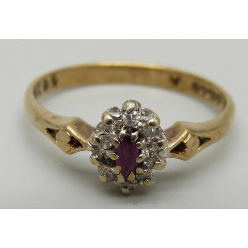 1181 - A 9ct gold, ruby and diamond cluster ring, 1.8g, O